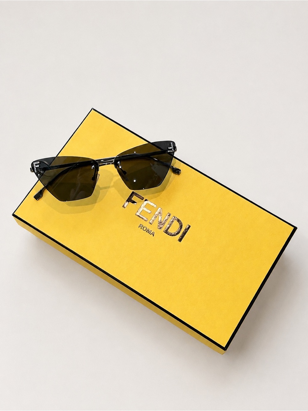 Fendi Black Cat-Eye Sunglasses with Dark Lenses and crystal embellished logo
